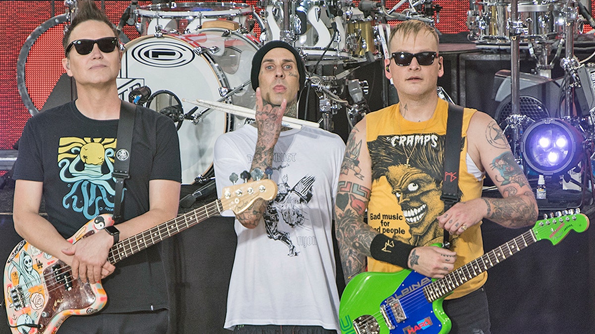 NEW YORK, NY - JULY 19:  (L-R) Mark Hoppus, Travis Barker and Matt Skiba of Blink 182 perform on ABC'c 