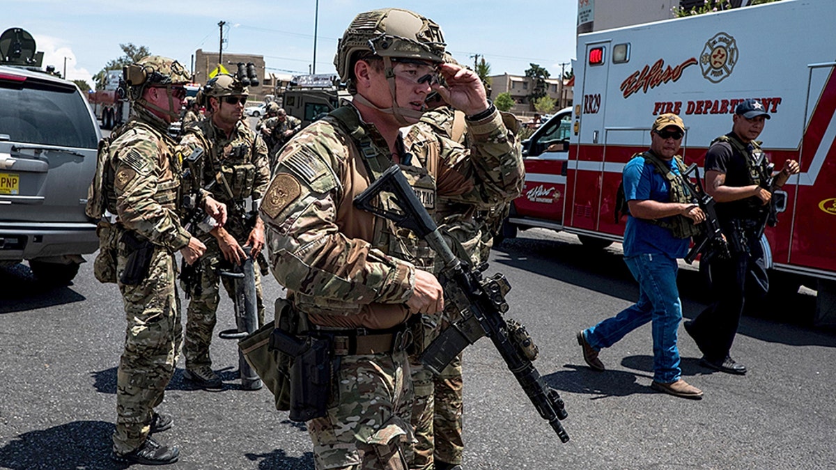 Law enforcement agencies respond to the shooting at a Walmart near Cielo Vista Mall in El Paso, Texas, on Aug. 3.