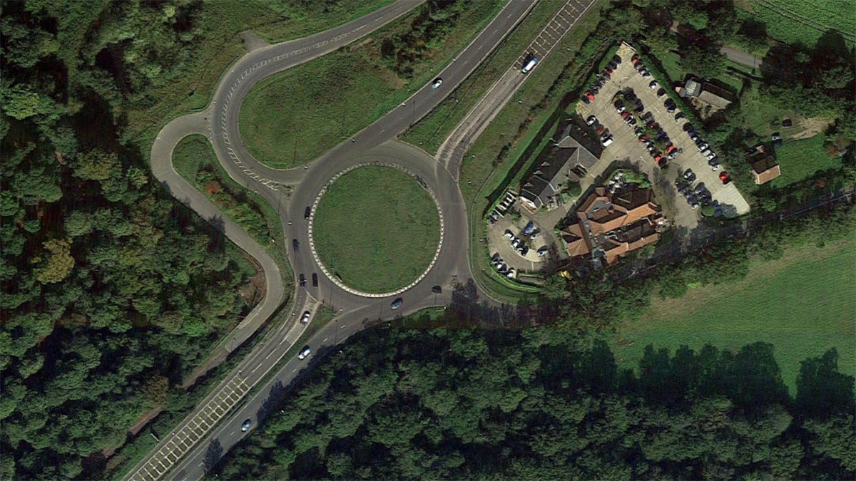 The roundabout is at the end of a high-speed section of road.