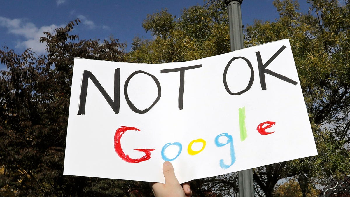 A Google employee holds a sign during a walkout to protest how the tech giant handled sexual misconduct in New York, Thursday, Nov. 1, 2018.