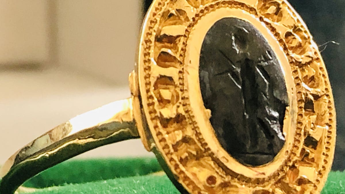 The ring bears a Latin inscription. (SWNS)