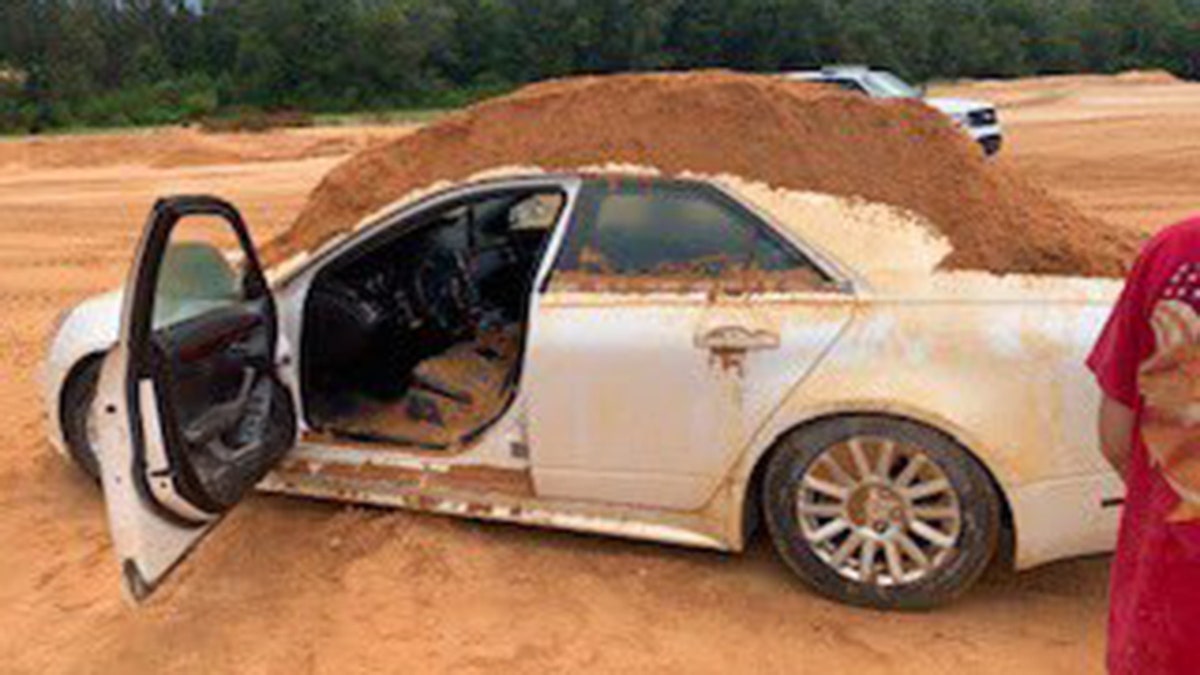 A Florida man dumped dirt on his girlfriend's borrowed Cadillac.