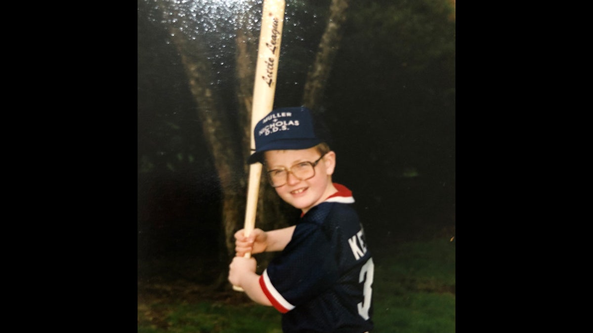 Jacob Keltner, shown here as a boy, played in Little League. Becki tells Fox News that the weekend before Jacob died, he took Caleb to a baseball clinic in preparation for his son’s first Little League season and took him out shopping for gear afterward. Jacob purchased Caleb a Chicago Cubs hat and he continues to wear it ‘all the time,’ Becki says. She has attended all of Caleb’s practices and games this season, but she says opening day was ‘so hard for me’ as her son ‘should have been able to have his dad there.’ A loving father, she added, who ‘wanted to be there and help his son.’