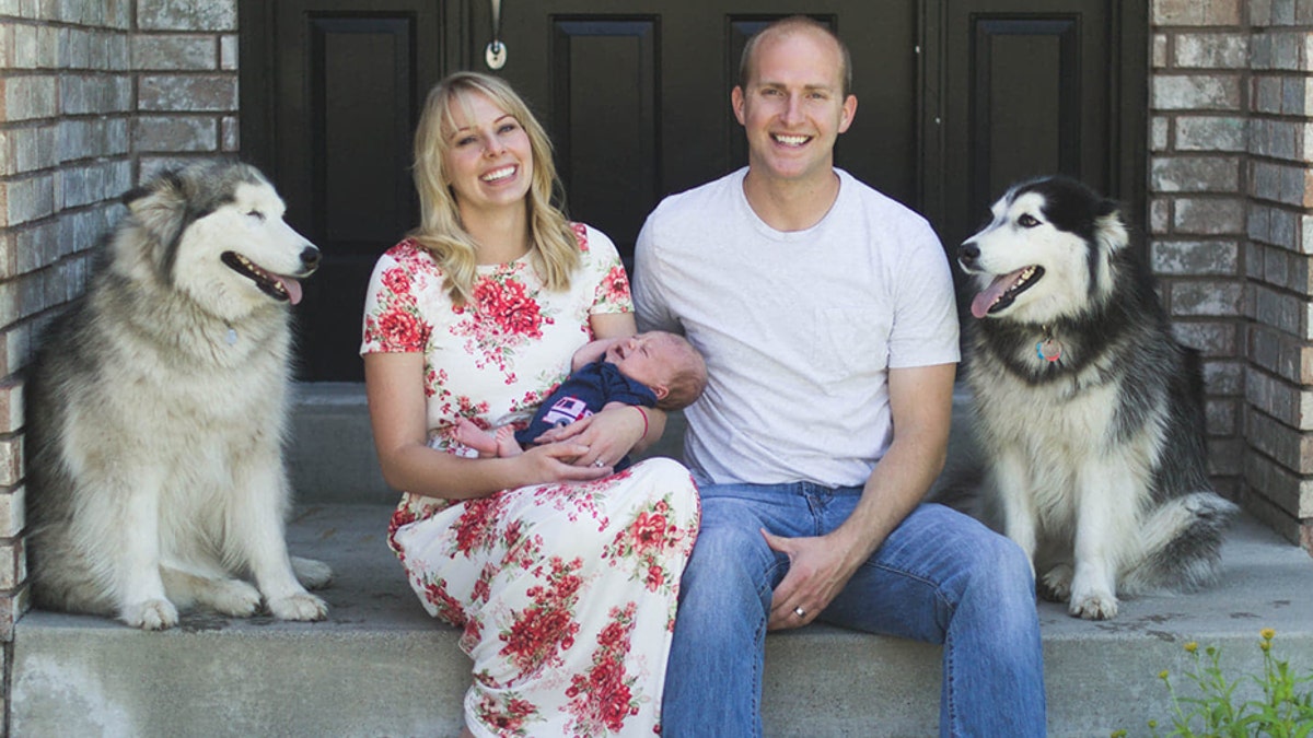 Joseph Shinners pictured with his wife Kaylyn, their son, and their two dogs. "He was a really good Dad – and a really good husband," Kaylyn says.