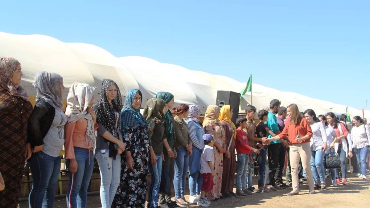 Kurdish women in their protest human shield in Syria