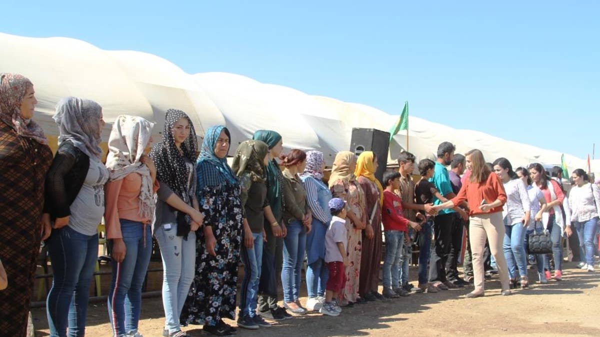 Kurdish women in their protest human shield in Syria