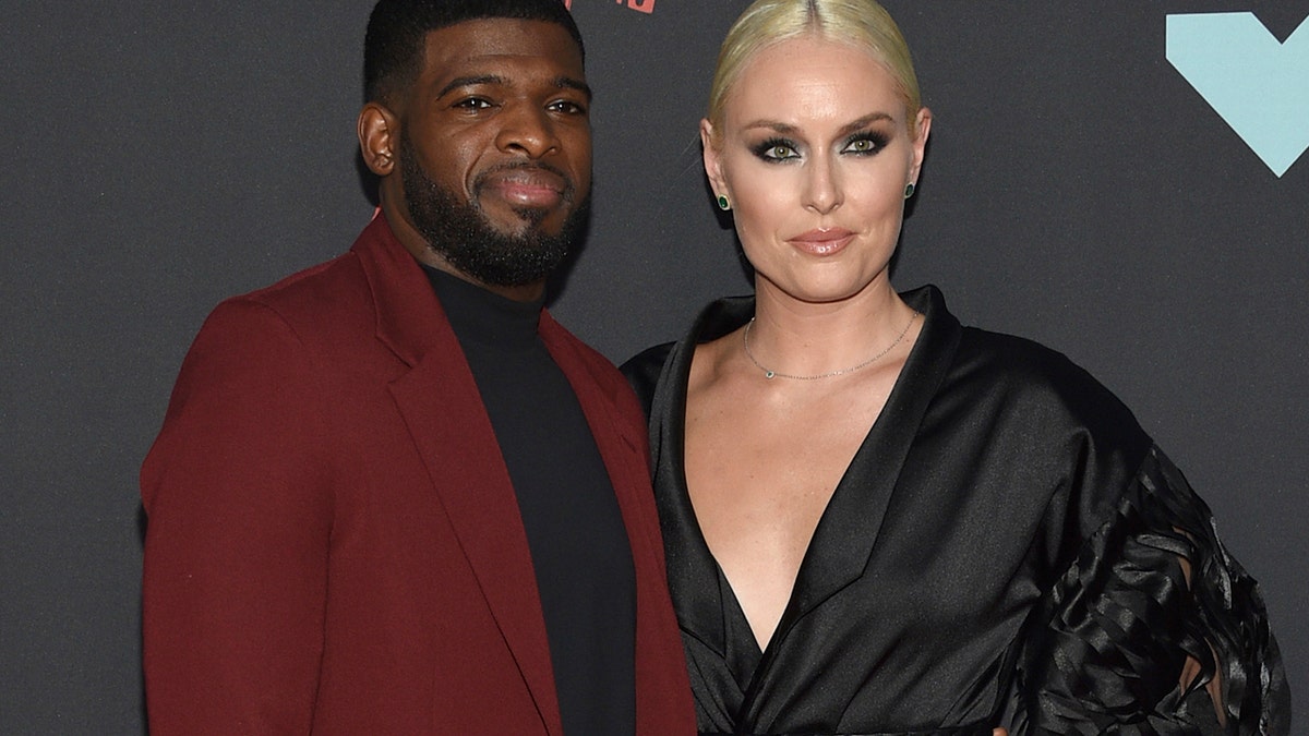 P. K. Subban, left, and Lindsey Vonn's wedding plans are temporarily on hold 