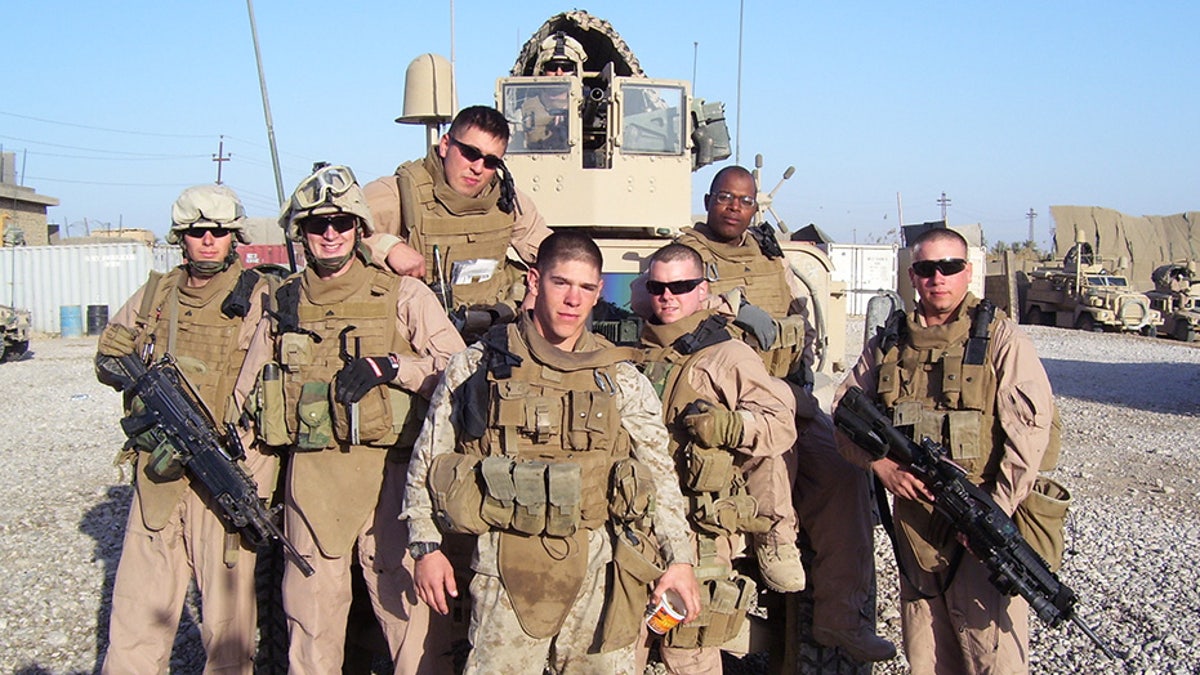 Matthew Rittner, pictured here in the center, served in the Marine Reserve Unit Fox Company, 2nd Battalion, 24th Marines, based out of Milwaukee. He was an infantry rifleman and later achieved the rank of sergeant during his 8 years of service, which included two tours in Iraq, the Department of Veterans Affairs says.