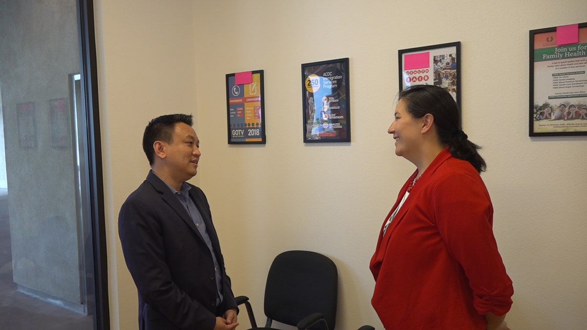 Duy Nguyen, executive director of One APIA Nevada (left) talks with Democratic Assemblywoman Rochelle Nguyen (right).