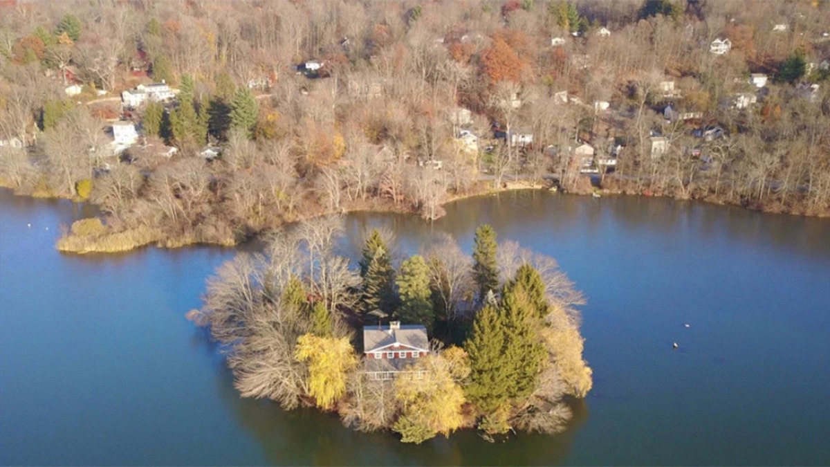 Just 60 miles north of Manhattan, a small island with a wee house has hit the market.