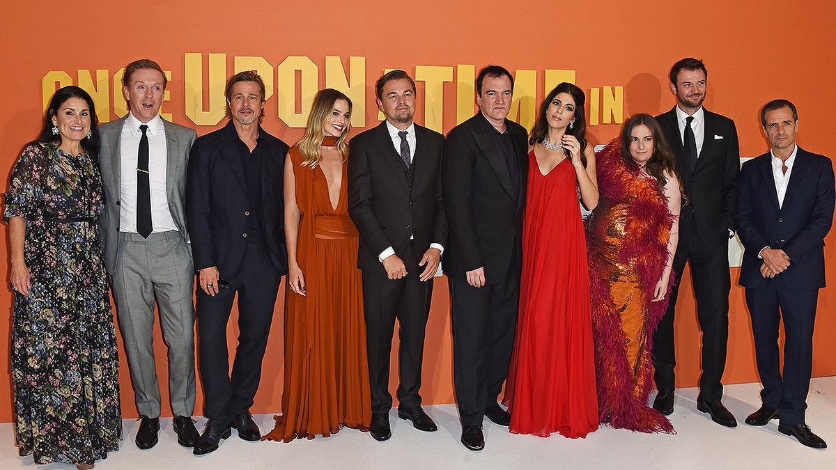 LONDON, ENGLAND - JULY 30:  (L to R) Shannon McIntosh, Damian Lewis, Brad Pitt, Margot Robbie, Leonardo DiCaprio, Quentin Tarantino, Daniela Pick Tarantino, Lena Dunham, Costa Ronin and David Heyman attend the UK Premiere of 