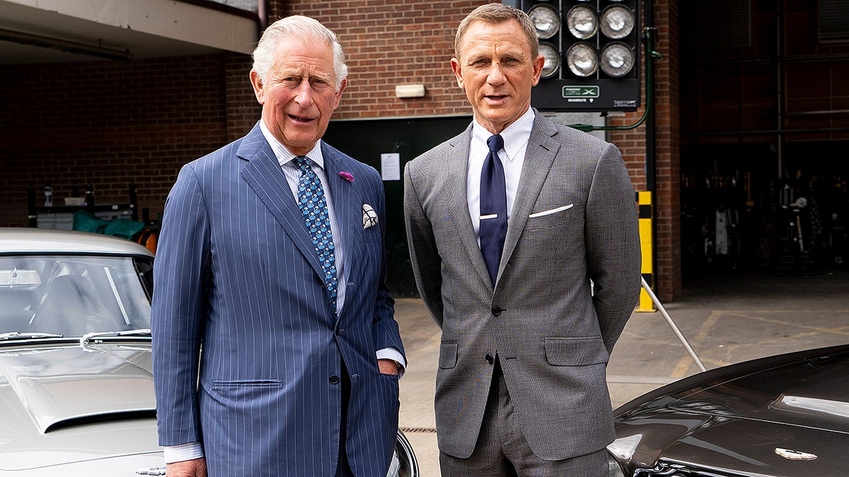 IVER HEATH, ENGLAND - JUNE 20: Prince Charles, Prince of Wales poses with British actor Daniel Craig as he tours the set of the 25th James Bond Film at Pinewood Studios on June 20, 2019 in Iver Heath, England. The Prince of Wales, Patron, The British Film Institute and Royal Patron, the Intelligence Services toured the set of the 25th James Bond Film to celebrate the contribution the franchise has made to the British film industry. (Photo by Niklas Halle'n - WPA Pool/Getty Images)