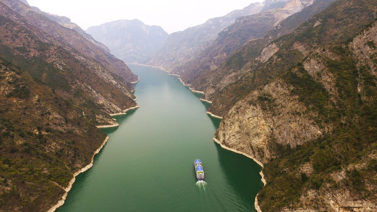 A ship sails in the Wuxia Gorge, one of the Three Gorges on the Yangtze River, in Wushan County, southwest China, back in March.  (Xinhua/ via Getty Images)