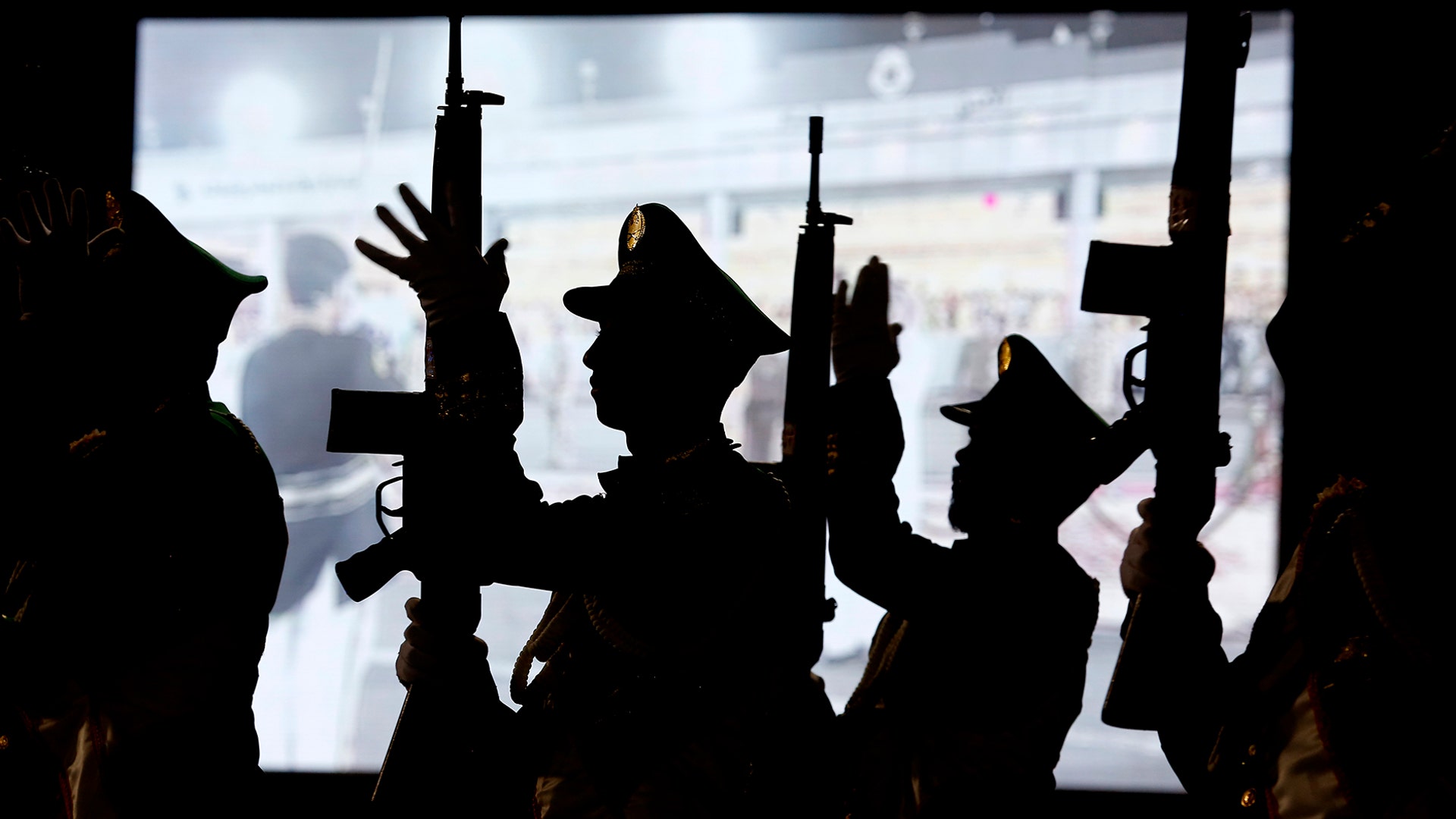 A Saudi honor guard performs during a military parade in preparation for the annual Hajj pilgrimage, in the Muslim holy city of Mecca, Saudi Arabia, Aug. 4, 2019. 