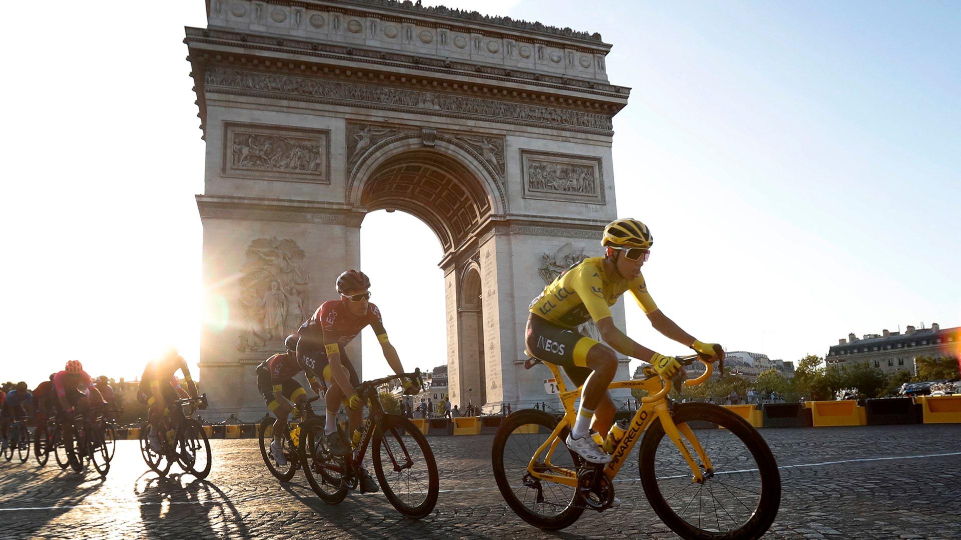 Colombia's Egan Bernal rides past the Arc de Triomphe on the Champs-Elysees on his way to winning the Tour de France cycling race in Paris, July 28, 2019.