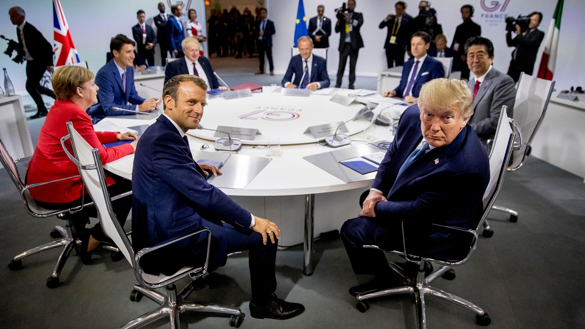 French President Emmanuel Macron and President Donald Trump participate in a G-7 Working Session on the Global Economy, Foreign Policy, and Security Affairs the G-7 summit in Biarritz, France, Aug. 25, 2019. 