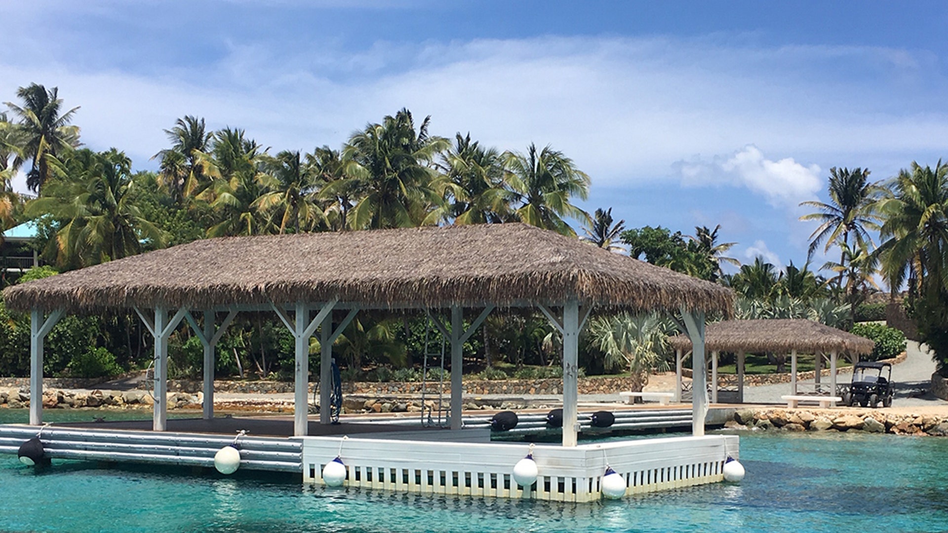 A covered boat dock on billionaire Jeffrey Epstein's Little St. James Island in the U.S. Virgin Islands. Epstein purportedly ferried over young women from St. Thomas Island to his private residence on the 73-acre property.