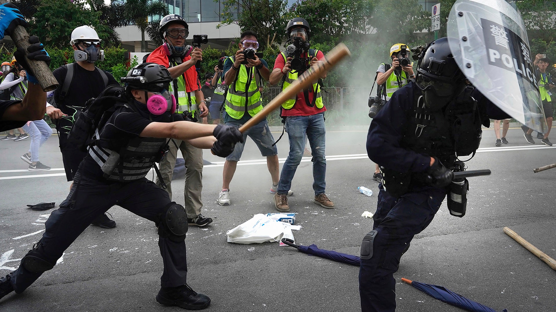 Police and demonstrators clash during a protest in Hong Kong, Aug. 24, 2019. 