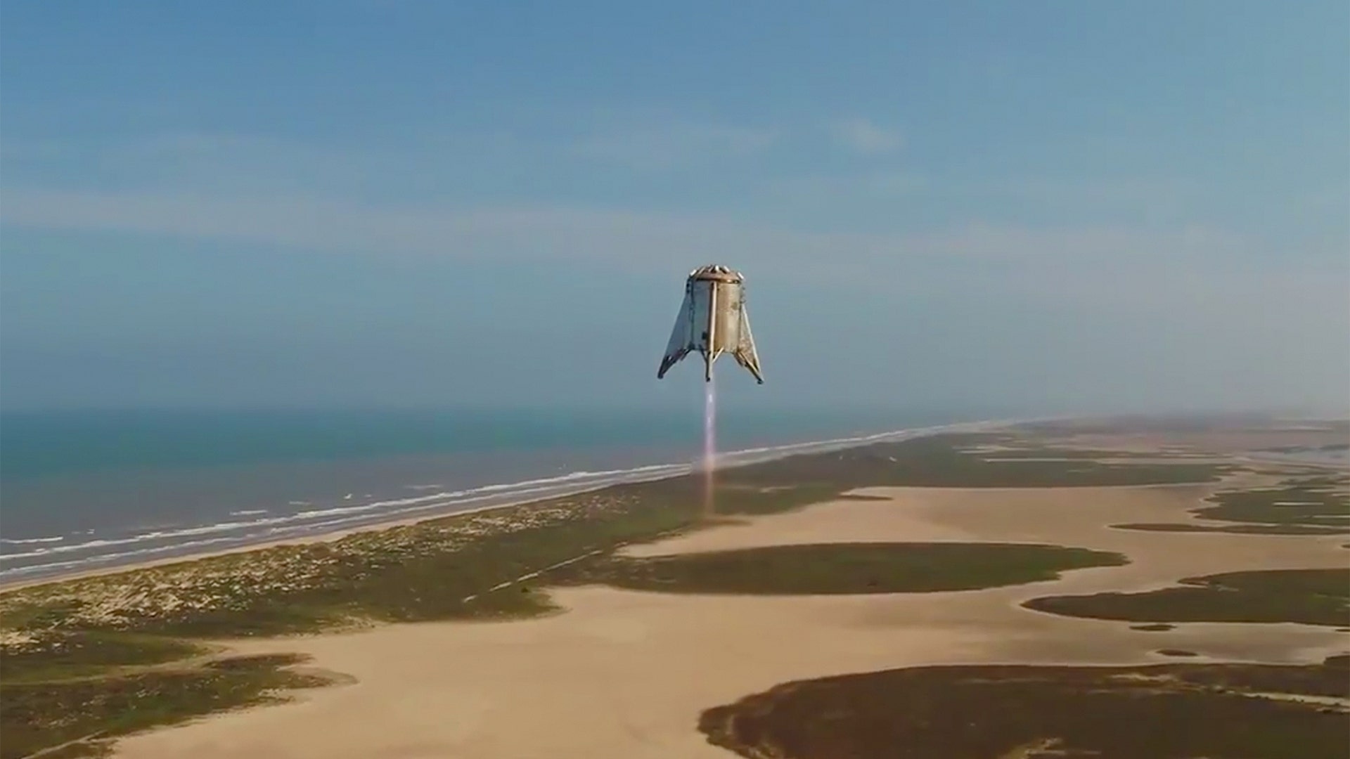 SpaceX's Starhopper, the first prototype for its Mars-colonizing Starship vehicle lifts off during a short test flight in Boca Chica, Texas, Aug. 27, 2019.
