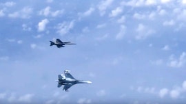 Russian fighter jet chases off NATO warplane approaching plane carrying Russian Defense Minister over neutral waters