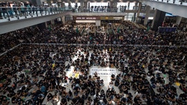 Hong Kong airport continues to see delays; thousands of protesters occupy terminals for fifth day