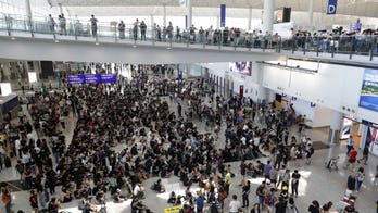 US, China spar over Hong Kong after ‘thuggish regime’ remarks as activists launch latest airport protest