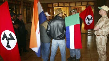 South Africa bans deliberate display of apartheid-era flag after court rules it amounts to hate speech