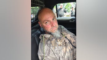 Wanted Tennessee inmate was caught after being spotted rifling through strangers' refrigerator