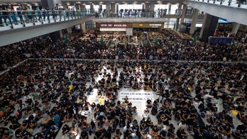Hong Kong International Airport cancels all flights, China compares protest to 'terrorism'
