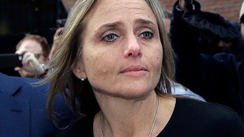 Judge accused of helping shield illegal immigrant has pay restored as case proceeds