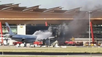 Air China plane catches fire, sustains extensive damage as passengers prepare to board