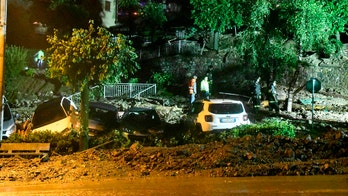 Hundreds evacuated near Lake Como after landslide triggered by heavy rain hits Italian town