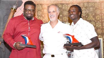 Carnival Cruise Line honors men who saved wheelchair-bound passenger who rolled off dock in St. Thomas