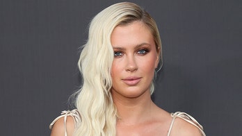 Ireland Baldwin covers breasts with 'I voted' stickers ahead of the 2020 presidential election