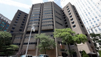 Jeffrey Epstein's prison guards: 1 not a regular officer and both were working overtime, report says