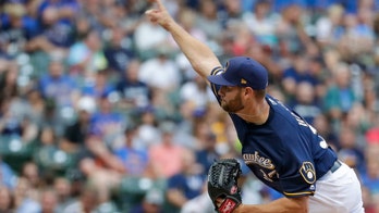 Milwaukee Brewers' Adrian Houser throws up during game, hurls 10-strikeout gem