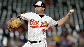 Baltimore Orioles' Richard Bleier gets into argument with coach in dugout
