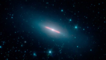 NASA spots perfectly sideways galaxy that looks like a lightsaber