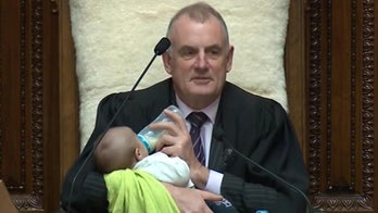 New Zealand lawmaker brings baby to parliament, speaker takes on role of babysitter