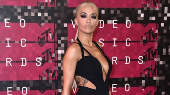 Pop star Rita Ora shows off fit physique, catches sun rays in tiny two-piece bikini aboard yacht in Spain