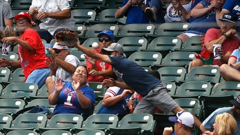 Woman hit in head by foul ball at Texas Rangers game, taken to hospital