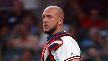 Atlanta Braves' Tyler Flowers bloodied after getting hit in head with Pete Alonso's bat