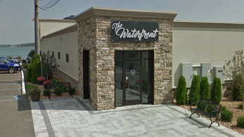 Man with boat full of bikini-clad women put on 'quite a show' at riverside restaurant, police say