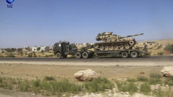 Al Qaeda-linked Syrian militants forced to flee key rebel town
