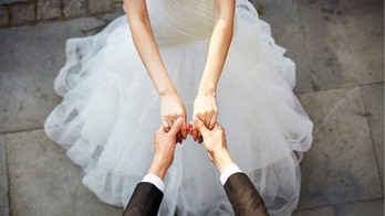 Wedding guests sing 'Stand By Me' in surprise performance for newlyweds