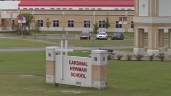 South Carolina teen charged after threatening videos, report says