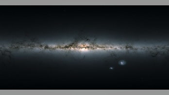 Astronomers baffled by 'cosmic mountain ranges' jutting through the Milky Way