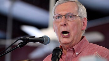 Mitch McConnell campaign criticized for photos of tombstones with Dem names