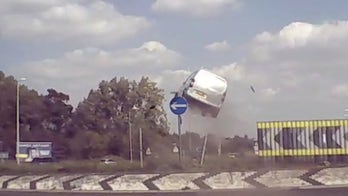 Video captures the moment a van jumps 10 feet into the air over roundabout