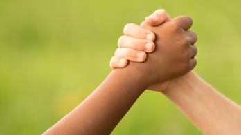 First day of school photo showing 8-year-old comfort classmate with autism goes viral: 'He helped me and I was happy'